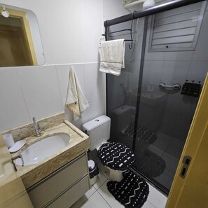 Hair dryer, towels, soap, shampoo