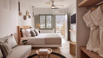 Deluxe Suite, Sea View | 1 bedroom, premium bedding, minibar, in-room safe