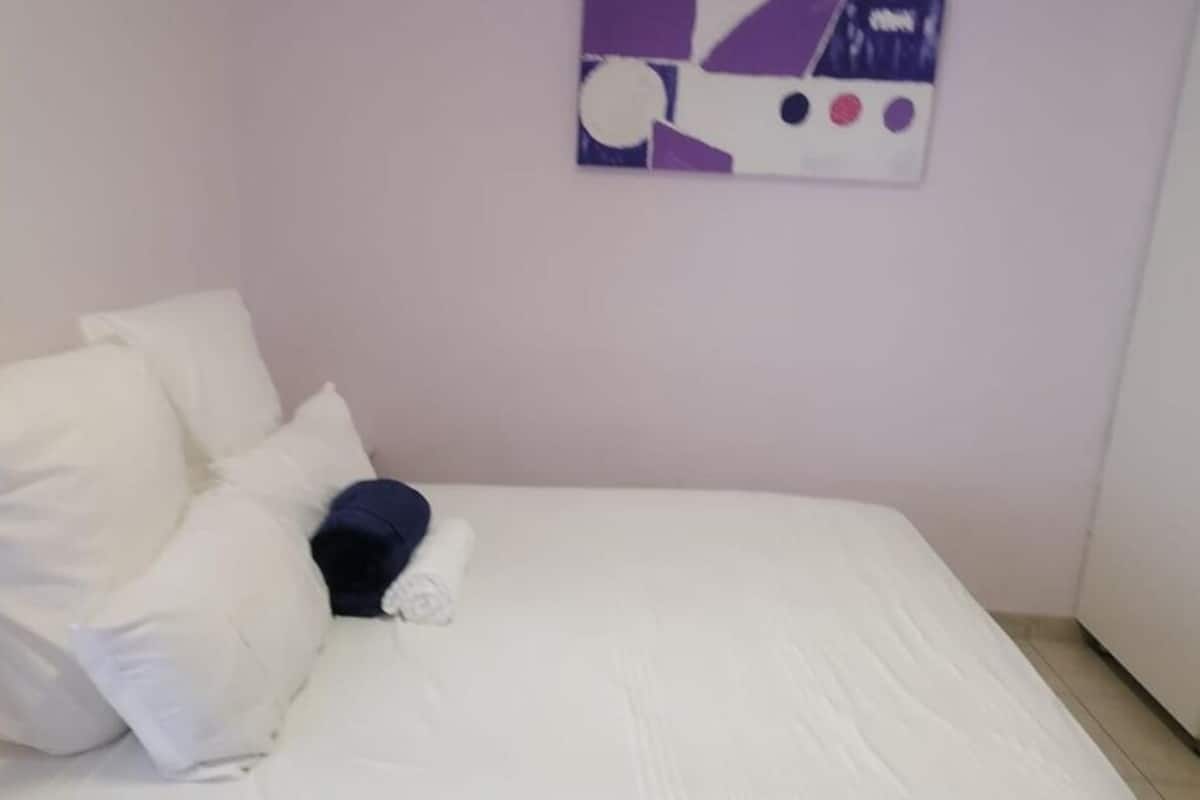 Suite Deluxe, accesible para personas con discapacidad, no fumadores | 1 dormitorio, wifi gratis, ropa de cama
