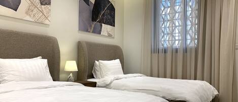 Design Apartment, 3 Bedrooms | Living area | Flat-screen TV