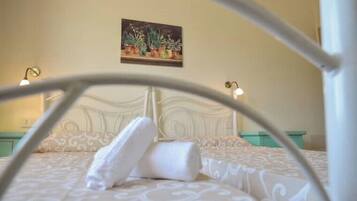 2 habitaciones, tabla de planchar con plancha y cuna de viaje