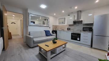 Business-Apartment | Wohnbereich | Flachbildfernseher