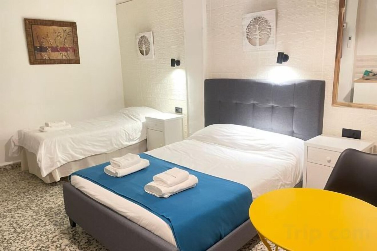 Luxe beddengoed, donsdekens, een strijkplank/strijkijzer, gratis wifi