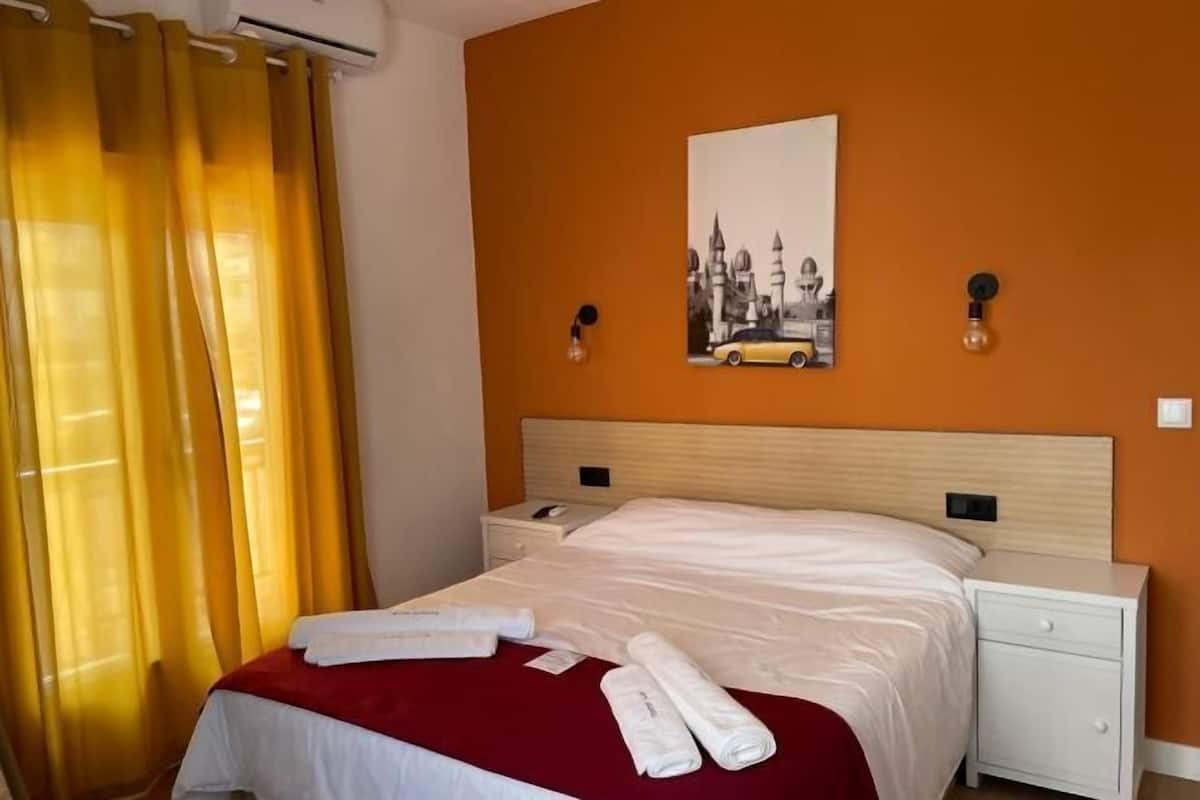 1 bedroom, premium bedding, down comforters, individually decorated