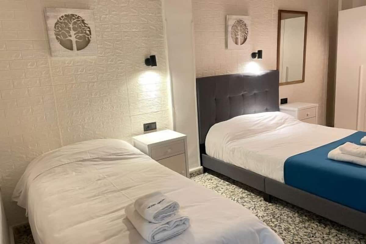 1 bedroom, premium bedding, down comforters, individually decorated