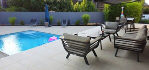 Et oppvarmet basseng