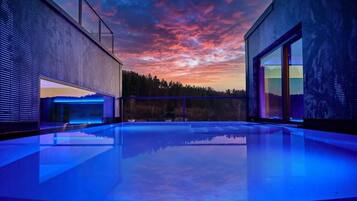 Indoor pool, outdoor pool, pool umbrellas, pool loungers