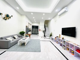 Habitación Deluxe, 2 habitaciones | Zona de estar
