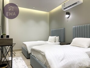 Design Apartment, 3 Bedrooms | 3 bedrooms, blackout drapes, iron/ironing board, free WiFi