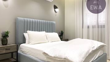 Design Apartment, 3 Bedrooms | 3 bedrooms, blackout drapes, iron/ironing board, free WiFi