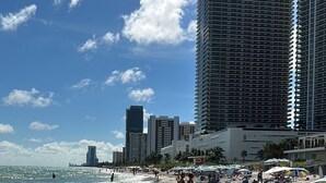 A beach with a high-rise building in the background. - Lyfe Resort and residences, Ocean Front 35th floor, great views guaranteed! (Hollywood)