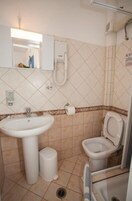 Ducha, secador de pelo, toallas