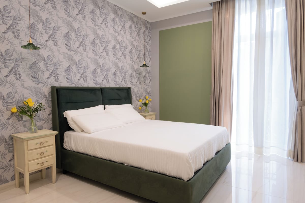 Deluxe appartement, meerdere bedden, uitzicht op bergen | 1 slaapkamer, luxe beddengoed, donzen dekbedden