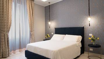 Premium bedding, down comforters, memory foam beds, minibar