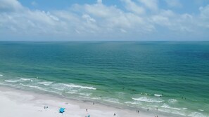 On the beach, sun-loungers, beach towels
