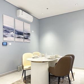 Design Apartment, 3 Bedrooms | Living area | Flat-screen TV