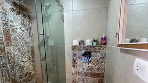 A bathroom with a shower, toilet, and sink. - Jounieh Cozy Apartment With Sea View (Jounieh)