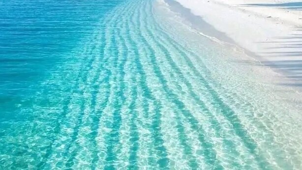 A beach with clear turquoise water and white sand. - Private 30A Retreat-Large Yard-Hot Tub-2 KING Suites-Fire Pit-Boat & RV parking. (Santa Rosa Beach)