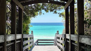 A wooden pathway leading to a beach with a clear view of the ocean. - Private 30A Retreat-Large Yard-Hot Tub-2 KING Suites-Fire Pit-Boat & RV parking. (Santa Rosa Beach)