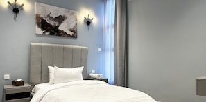 Design appartement, 3 slaapkamers | 3 slaapkamers, verduisterende gordijnen, een strijkplank/strijkijzer
