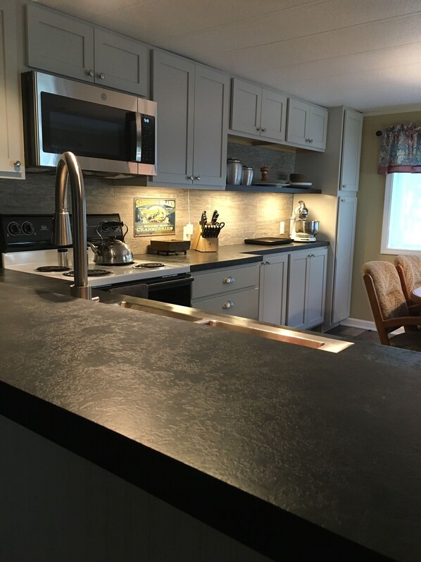 Fridge, microwave, oven, stovetop - Cottage On Sunset 2 Bedroom House Walk To Castle Rock Lake  New Lisbon WI (New Lisbon)