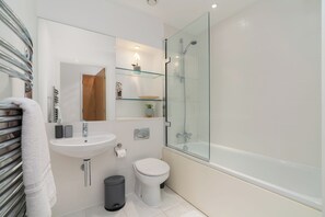 Hair dryer, towels, soap, shampoo