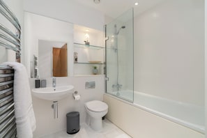 Hair dryer, towels, soap, shampoo