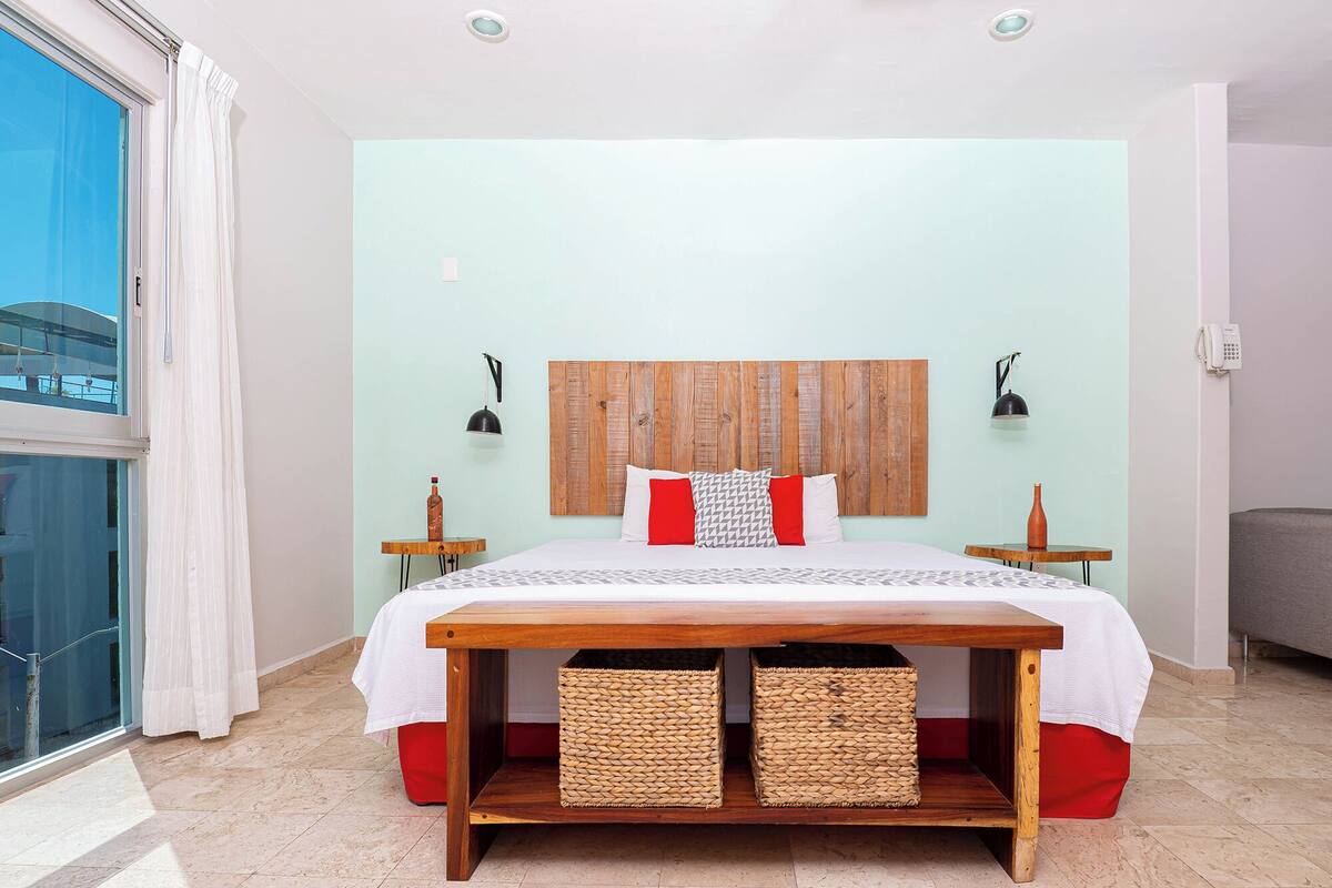 Family Studio Suite | Minibar, in-room safe, desk, laptop workspace