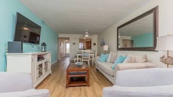 Condo, Multiple Beds, Balcony, Ocean View | Living area | 55-inch flat-screen TV with digital channels