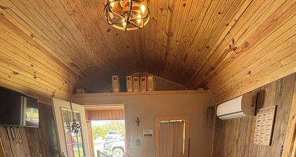 Cozy cabin features features queen pullout and twin in loft. Pet friendly