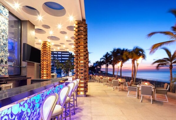 3 bars/lounges, swim-up bar, poolside bar