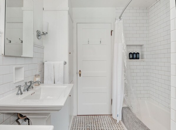Hair dryer, towels, soap, shampoo