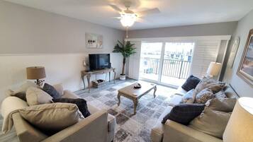 Condo, Multiple Beds, Balcony, Ocean View | Living area | 42-inch flat-screen TV with digital channels