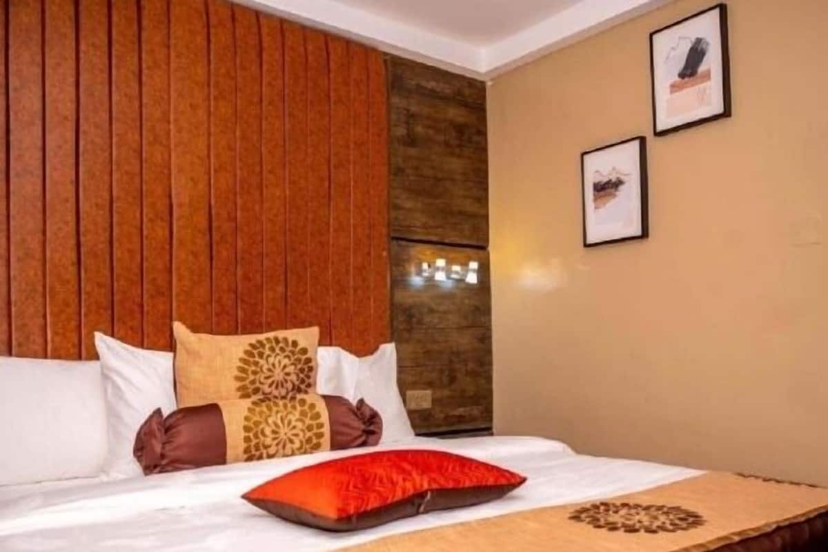 Deluxe Room, Pool View | 1 bedroom, individually furnished, desk, free WiFi