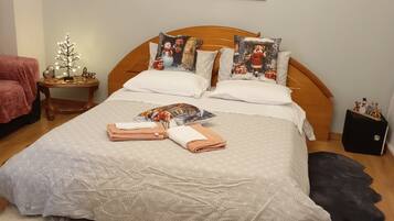 1 bedroom, desk, iron/ironing board, travel crib