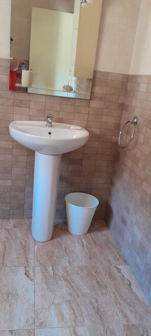 Bidet, towels, soap, shampoo