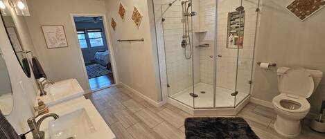 Shower, hair dryer, towels, soap