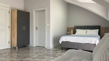 Family Penthouse, Sea View | Living area | 25-inch TV with premium channels