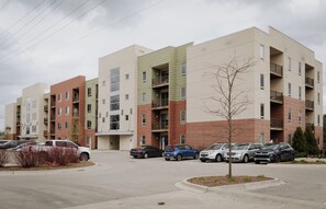 Exterior - Cozy new condo on TART trail and close to everything! Pet Friendly! (Traverse City)