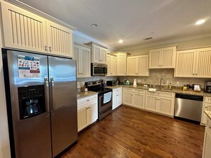 Private kitchen - "Coastal Charm: 3BR Townhome, Pool, Near St. Simons Attractions!" (St. Simons Island)