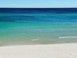 Private beach, white sand, sun loungers, beach umbrellas
