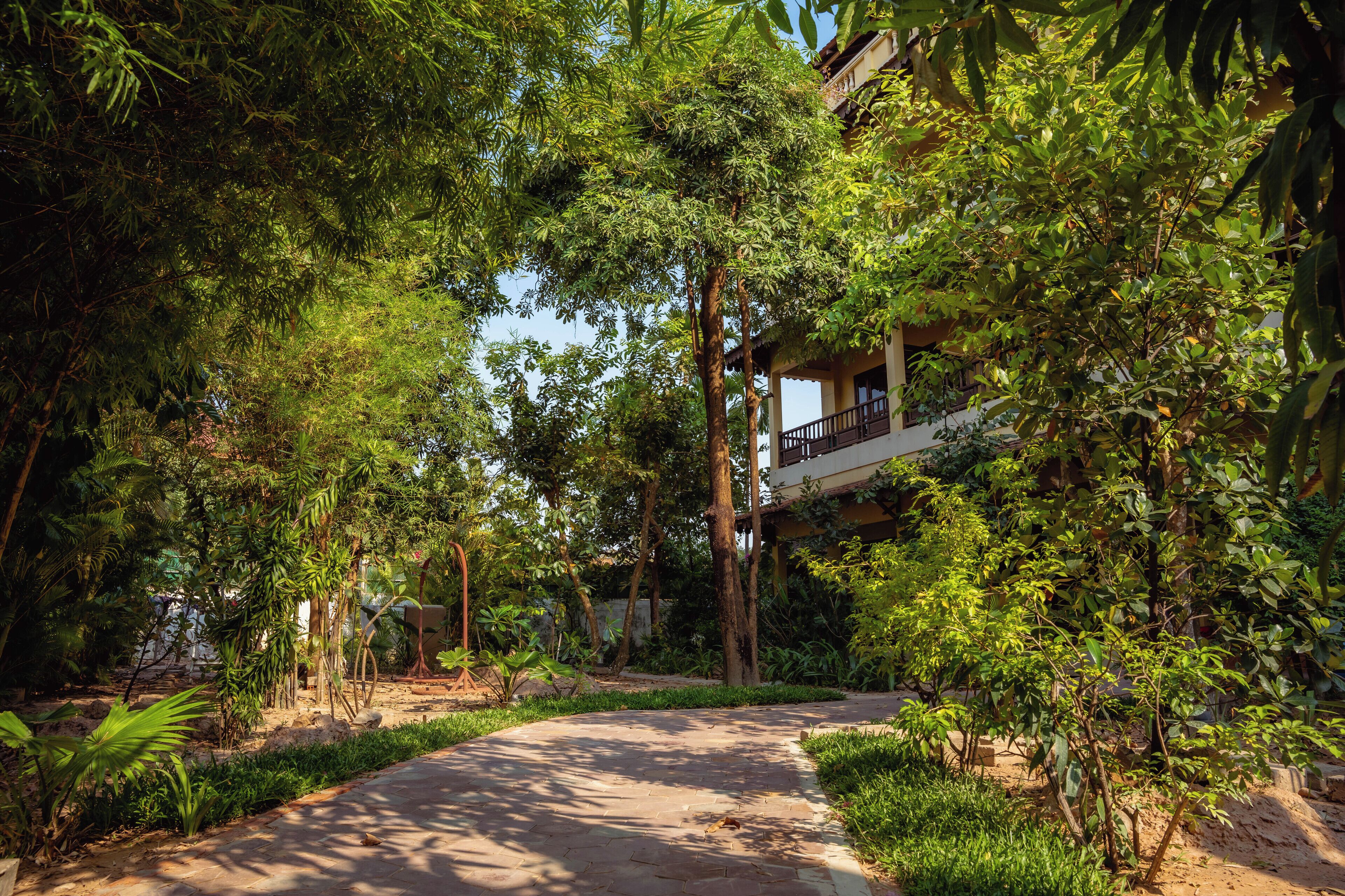 Family Triple Room, 2 Bedrooms, Garden View, Poolside | Garden view