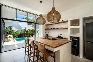 Villa, 1 Bedroom, Private Pool, Pool View | Private kitchen | Fridge, oven, stovetop, coffee/tea maker - Palm Residence Lot 22 Villa Uluwatu - Tranquil Stay with Modern Comfort (Pecatu)