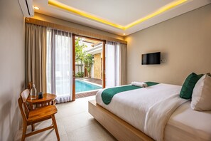 Villa, vistas a la piscina | Escritorio, espacio para trabajar con un portátil, wifi gratis
