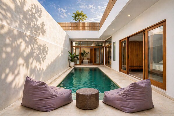 Outdoor pool, pool umbrellas, sun loungers