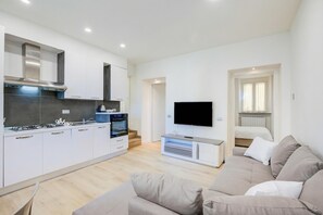 Family Apartment, Multiple Bedrooms (Patty New Apartment in Laveno Center) | Living area | Flat-screen TV - Patty New Apartment in Laveno Center (Laveno Mombello)
