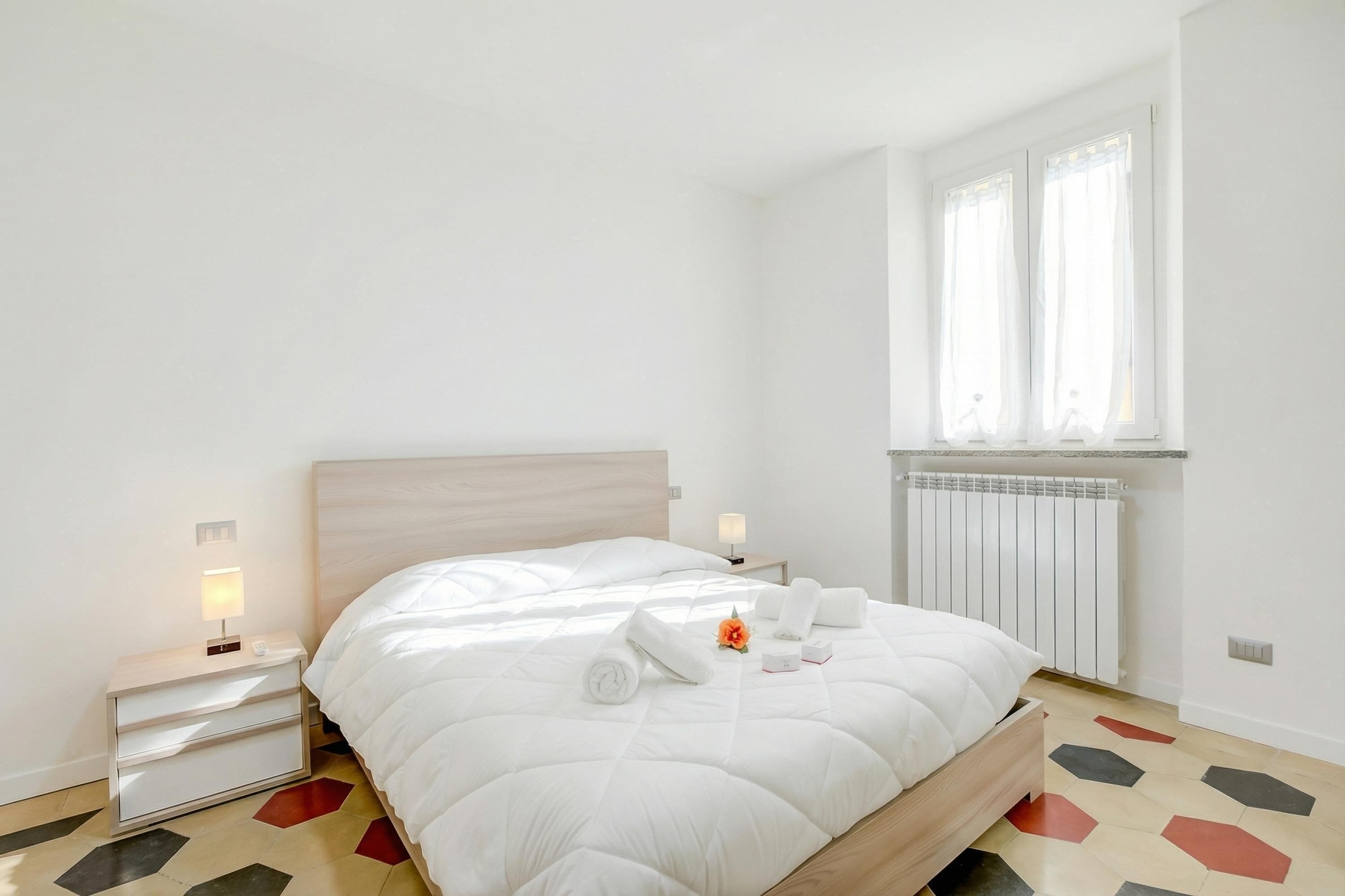 Familienapartment, Mehrere Schlafzimmer (Patty New Apartment in Laveno Center) | 2 Schlafzimmer, kostenloses WLAN, Bettwäsche