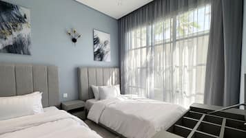 Design Apartment, 3 Bedrooms | 3 bedrooms, blackout drapes, iron/ironing board, free WiFi