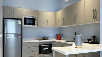 Design Apartment, 3 Bedrooms | Private kitchen | Electric kettle