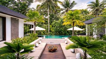 Outdoor pool, pool umbrellas, sun loungers